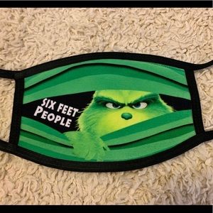 TWO grinch social distancing masks